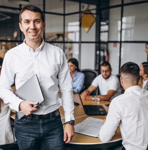 Group of people working out business plan in an office